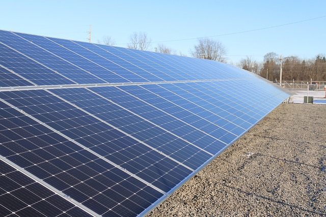 solar panels installed near agricultural buildings renewable energy farm